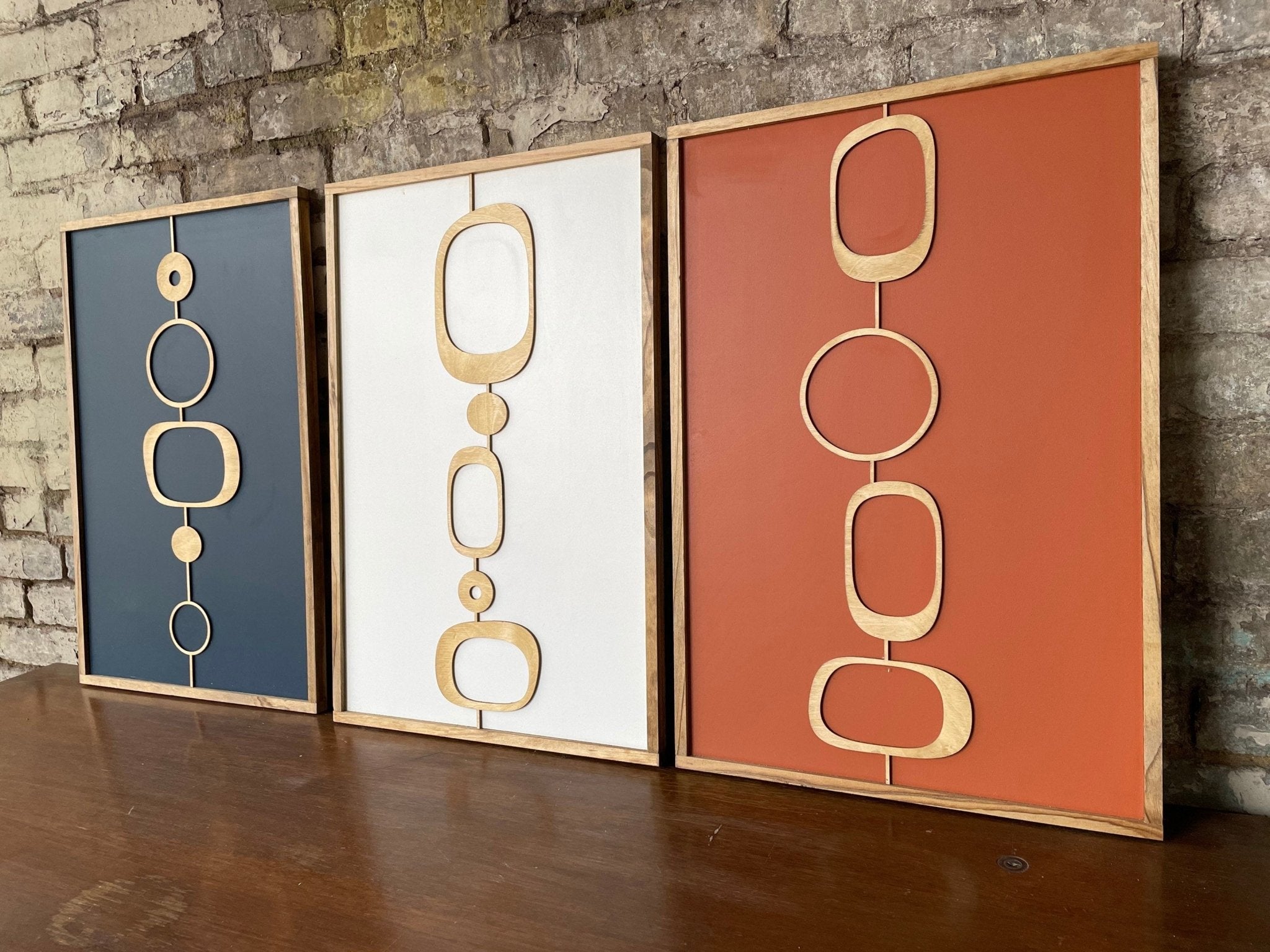 3-Piece Mid Century Modern Orange and Dark Blue Axiom Wood Wall